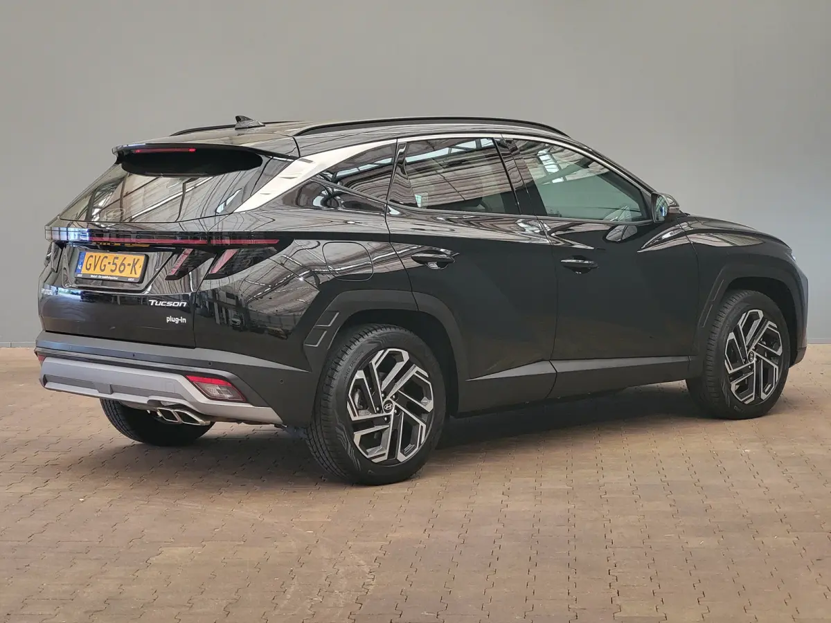 1.6 T-GDI PHEV Premium | Achterbank in delen neerklapbaar | Achterruitverwarming | Achteruitrij assistent | Leder | Stoelverwarming & Stoelventilatie | Elektrische achterklep | Elektr. stoel