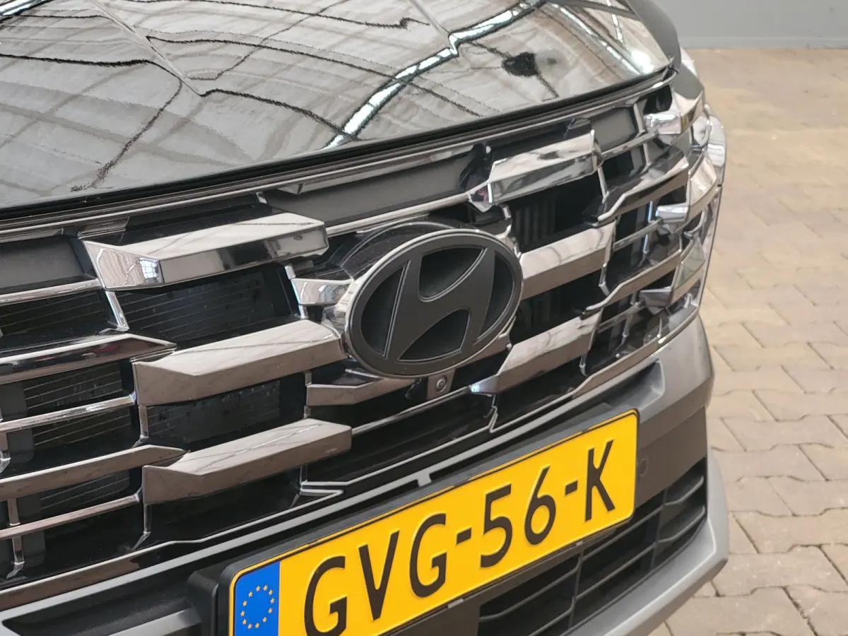 1.6 T-GDI PHEV Premium | Achterbank in delen neerklapbaar | Achterruitverwarming | Achteruitrij assistent | Leder | Stoelverwarming & Stoelventilatie | Elektrische achterklep | Elektr. stoel