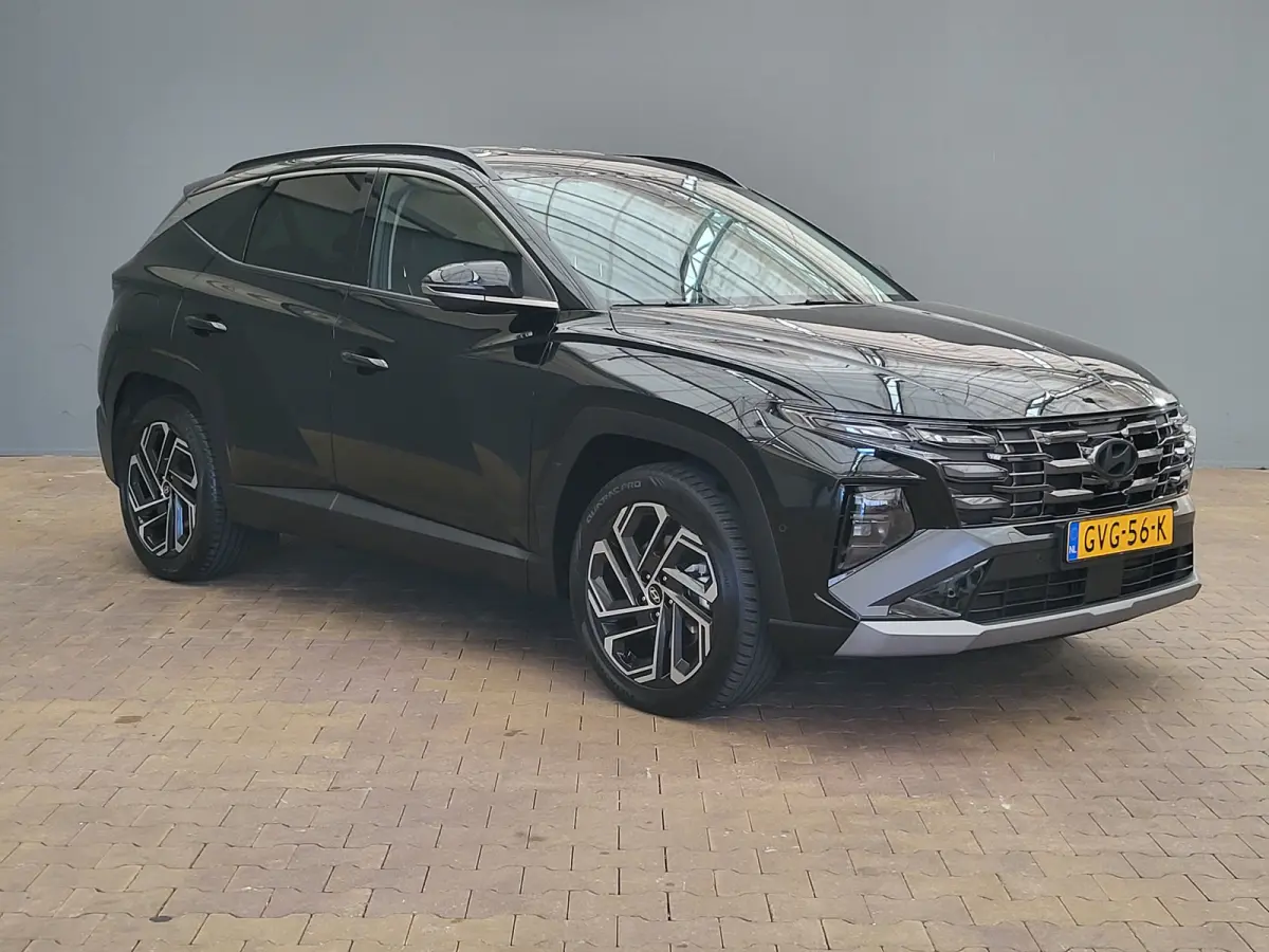1.6 T-GDI PHEV Premium | Achterbank in delen neerklapbaar | Achterruitverwarming | Achteruitrij assistent | Leder | Stoelverwarming & Stoelventilatie | Elektrische achterklep | Elektr. stoel