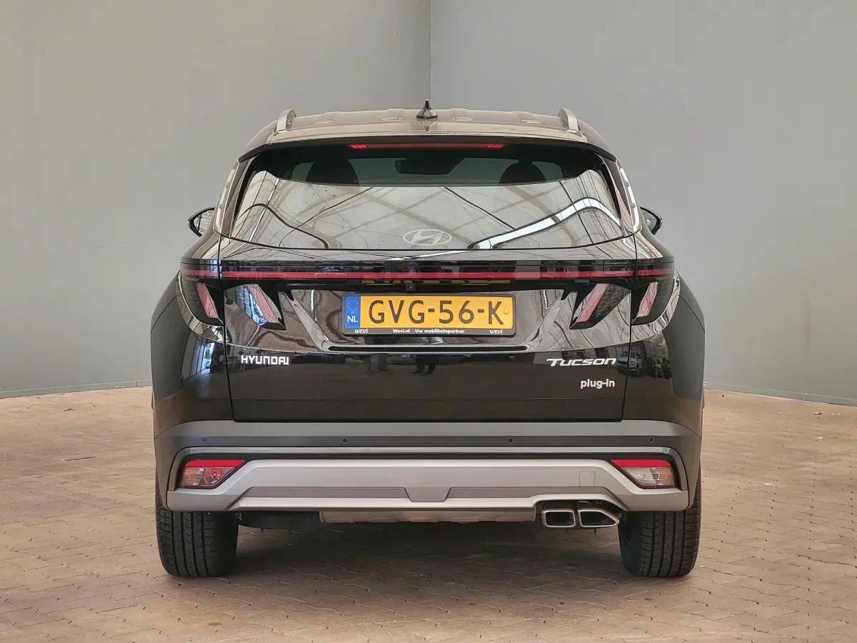 1.6 T-GDI PHEV Premium | Achterbank in delen neerklapbaar | Achterruitverwarming | Achteruitrij assistent | Leder | Stoelverwarming & Stoelventilatie | Elektrische achterklep | Elektr. stoel