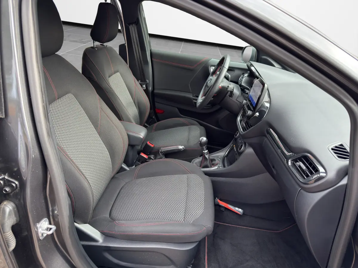 1.0 EcoBoost ST-Line 125pk | Winter- & Comfort Pack | Trekhaak | Privacy Glass | Navi & Carplay |