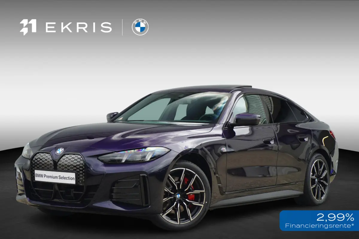 eDrive40 | M Sportpakket Pro | Harman Kardon | Active Cruise Control | Elektrisch verstelbare stoelen | Trekhaak