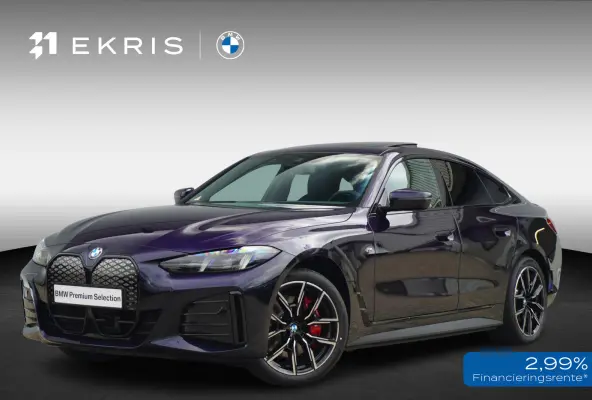 eDrive40 | M Sportpakket Pro | Harman Kardon | Active Cruise Control | Elektrisch verstelbare stoelen | Trekhaak