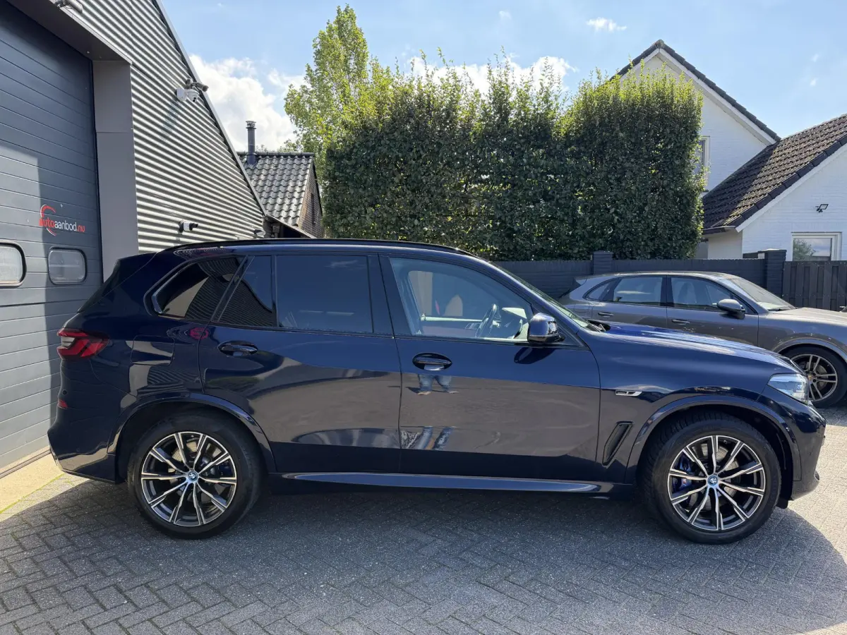 xDrive45e High Executive M-Sport | Navigatie | Luchtvering | DAB | Camera |