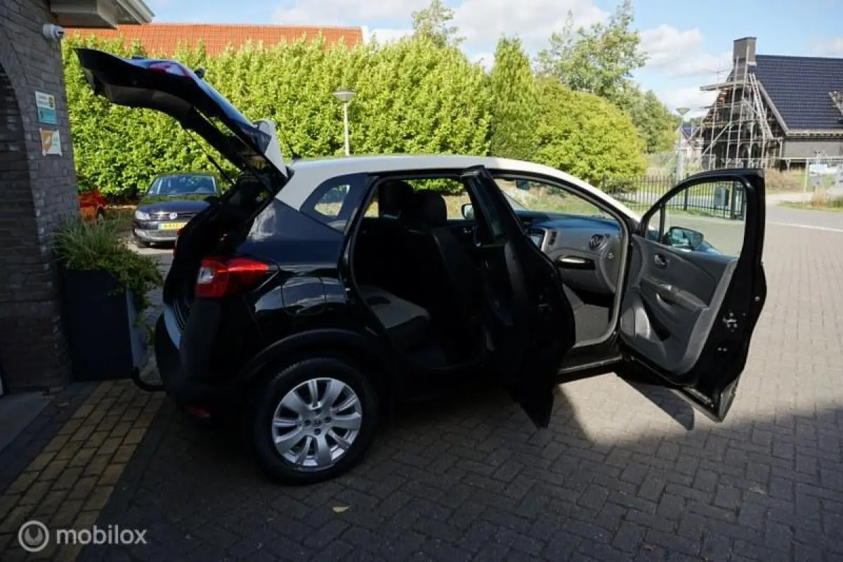 0.9 TCe Limited Edition dealer onderhouden !