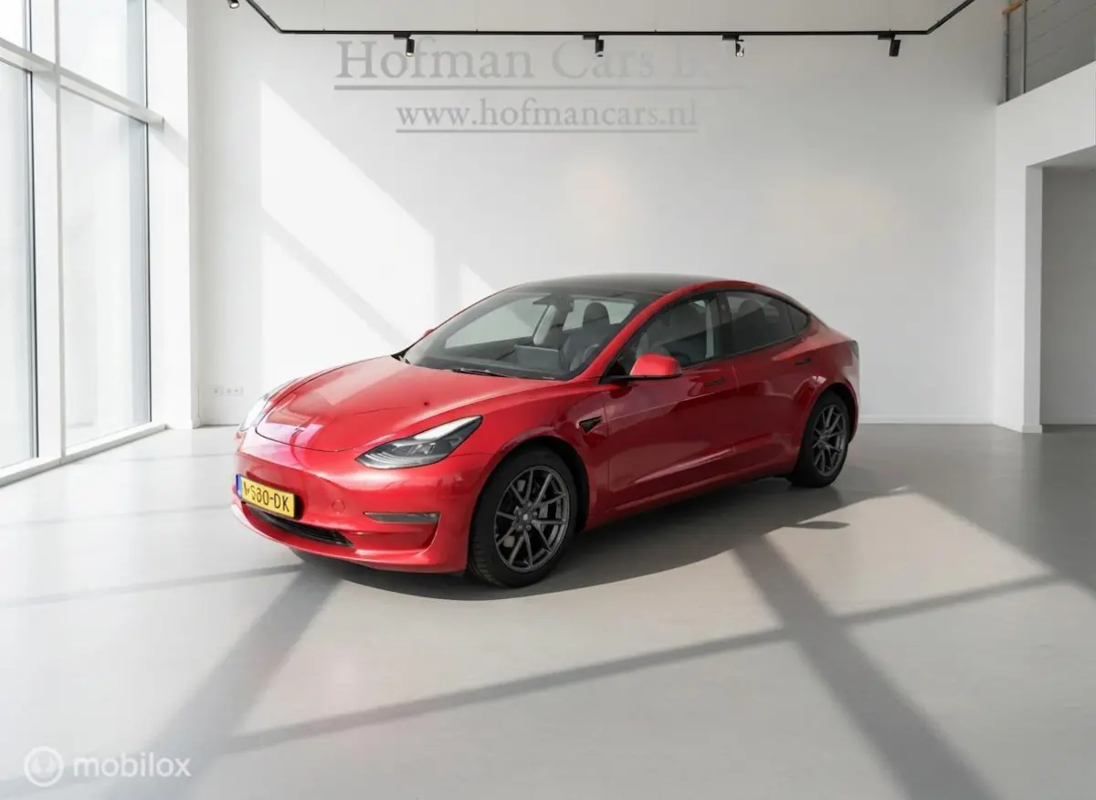Long Range AWD 75 kWh | Warmtepomp | 88,9% SOH | Rood Mica
