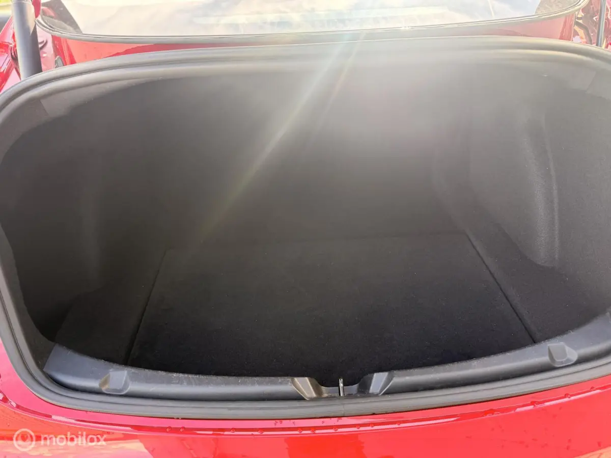 Long Range AWD 75 kWh | Warmtepomp | 88,9% SOH | Rood Mica