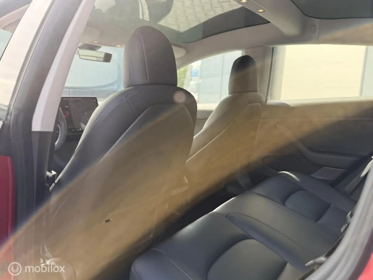 Long Range AWD 75 kWh | Warmtepomp | 88,9% SOH | Rood Mica
