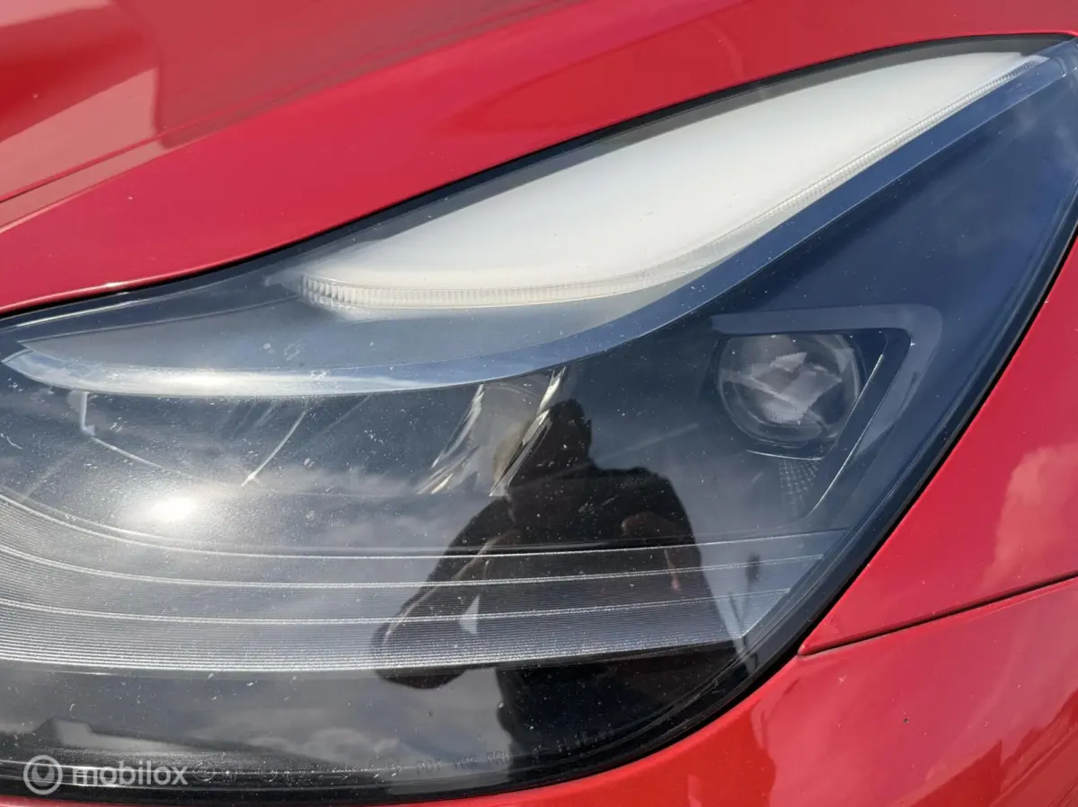 Long Range AWD 75 kWh | Warmtepomp | 88,9% SOH | Rood Mica