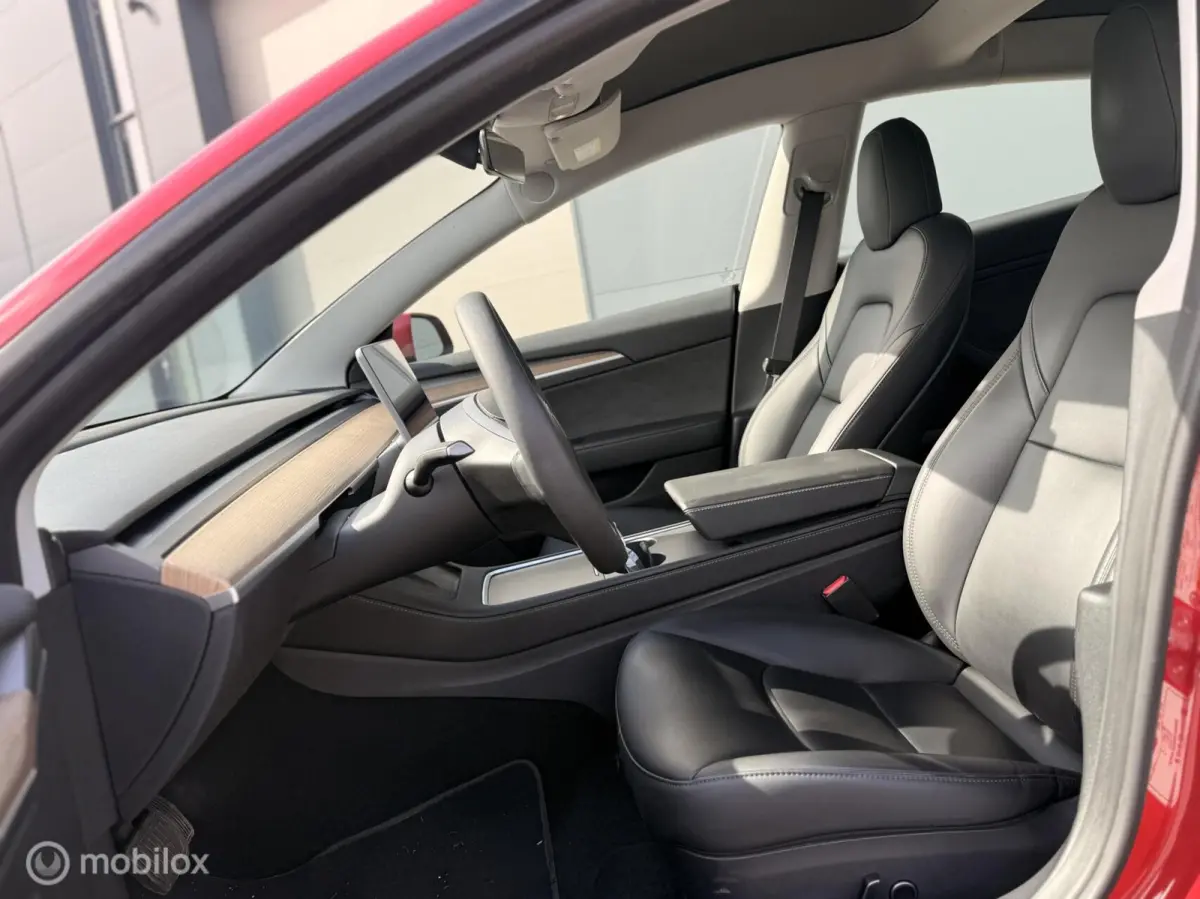 Long Range AWD 75 kWh | Warmtepomp | 88,9% SOH | Rood Mica
