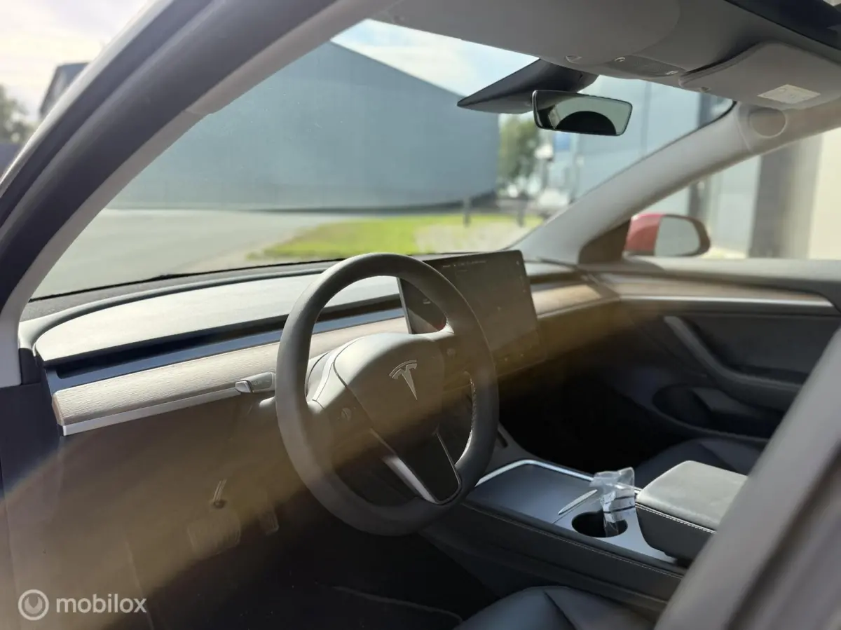 Long Range AWD 75 kWh | Warmtepomp | 88,9% SOH | Rood Mica