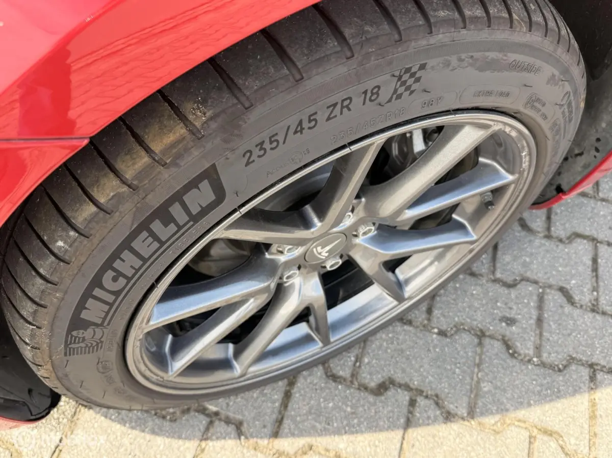 Long Range AWD 75 kWh | Warmtepomp | 88,9% SOH | Rood Mica