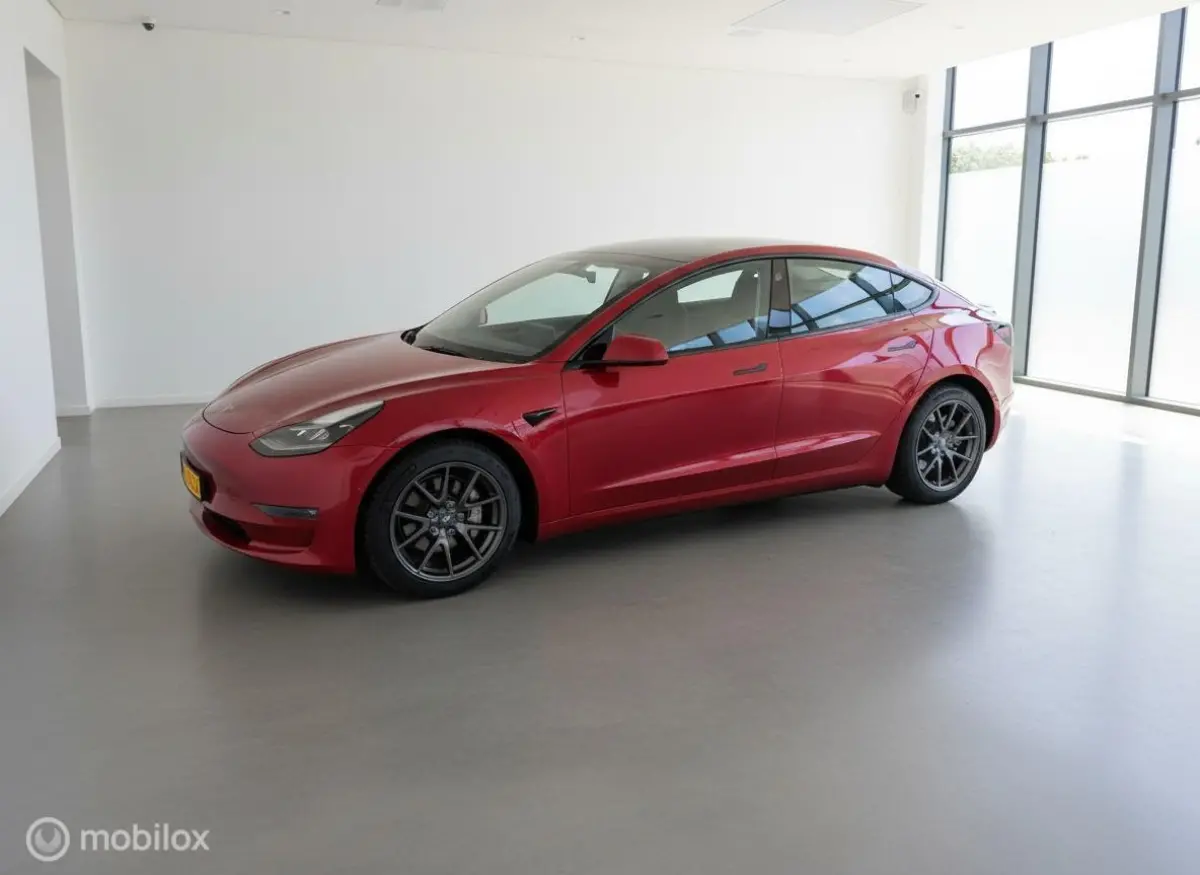 Long Range AWD 75 kWh | Warmtepomp | 88,9% SOH | Rood Mica