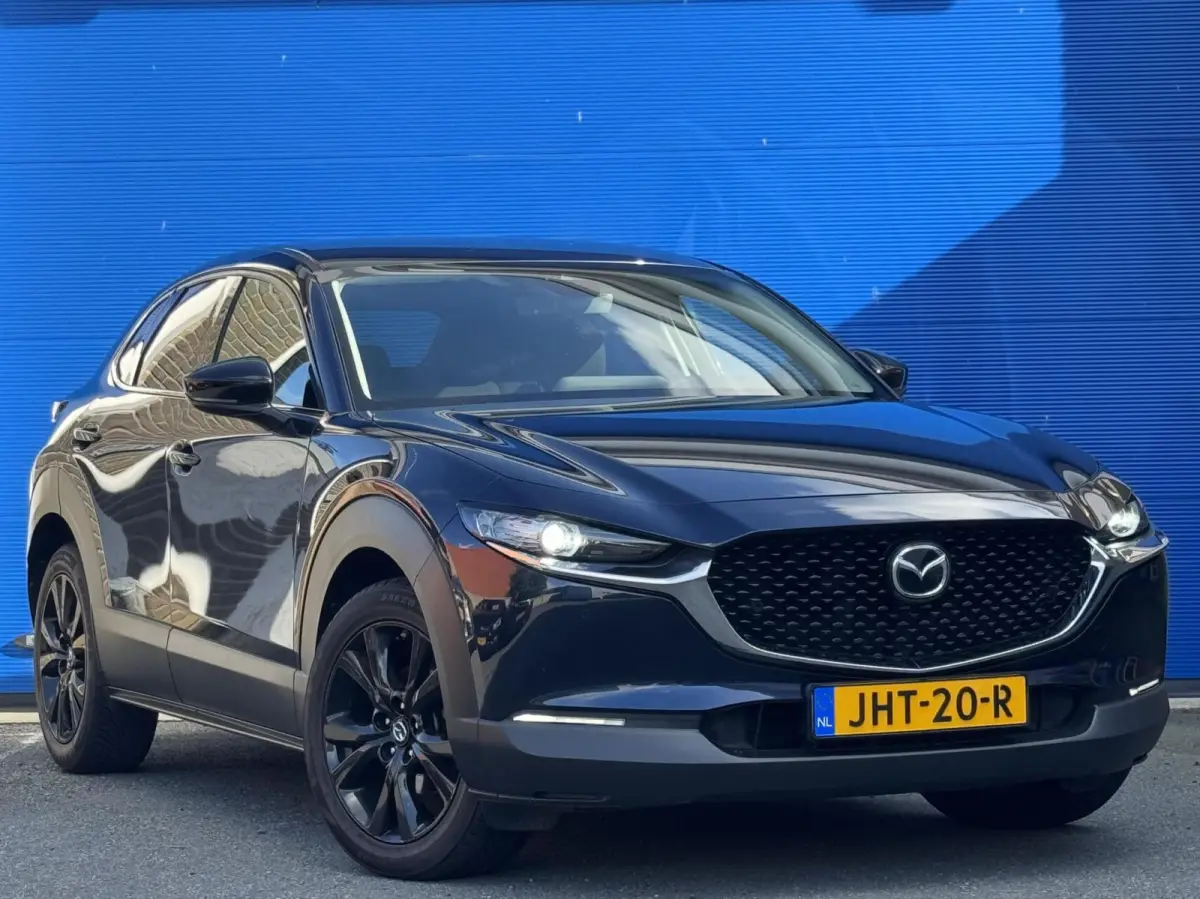 2.0 e-SkyActiv M Hybrid | HUD | Stoelverw. | Camera