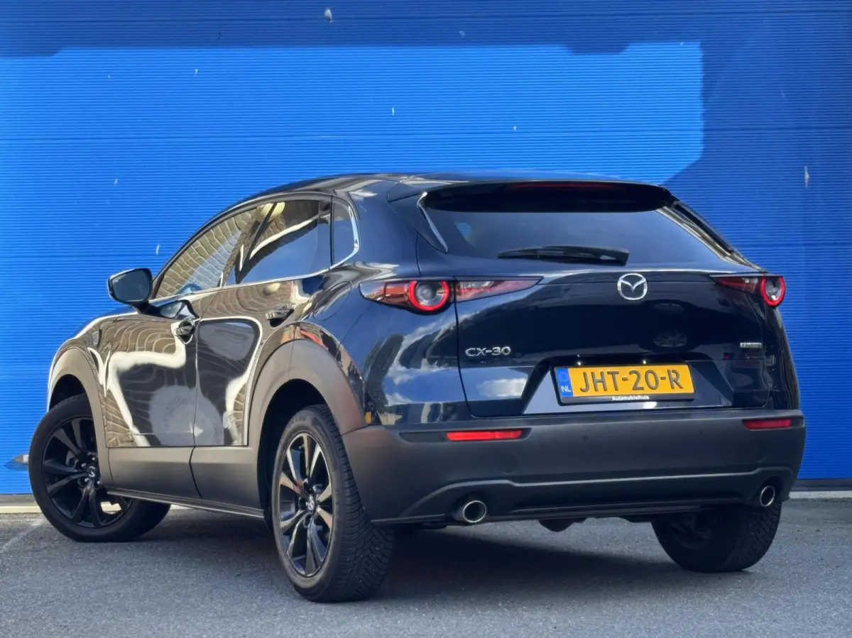 2.0 e-SkyActiv M Hybrid | HUD | Stoelverw. | Camera