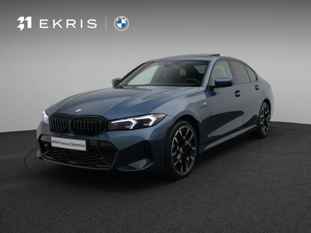 330e M Sportpakket Pro | Comfort Pack | Comfort Access | Achteruitrijcamera | Trekhaak | Elektrisch verwarmde voorstoelen | Active Cruise Control | Harman Kardon | Parking Assistant