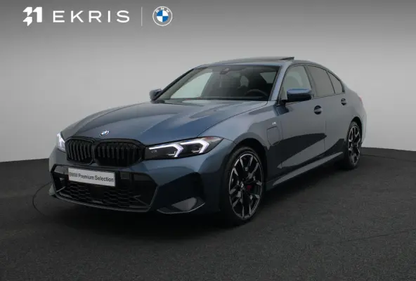 330e M Sportpakket Pro | Comfort Pack | Comfort Access | Achteruitrijcamera | Trekhaak | Elektrisch verwarmde voorstoelen | Active Cruise Control | Harman Kardon | Parking Assistant