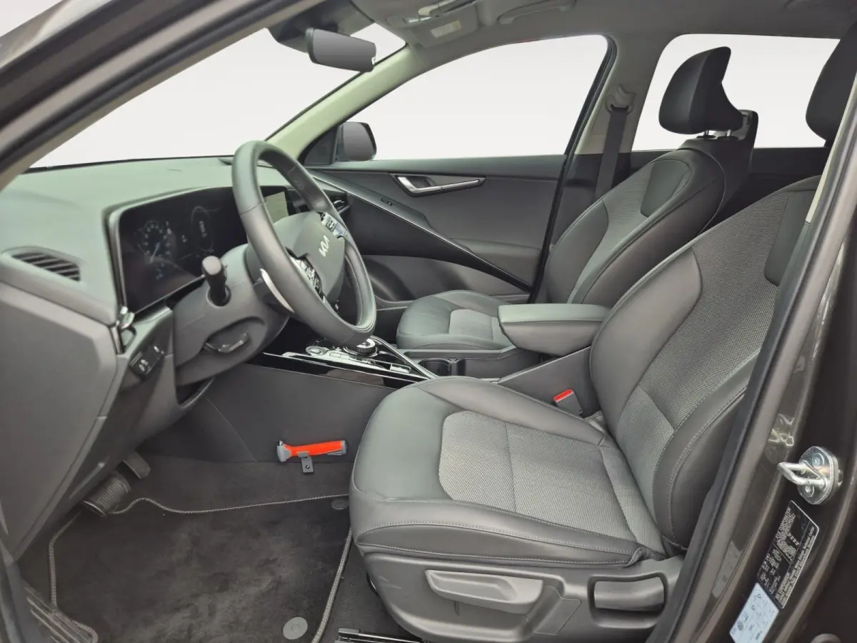 Edition 64.8 kWh | Afneembare Trekhaak | Climate Control | Cruise Control | Camera | Navigatie | Stoelverwarming | Stuurverwarming |