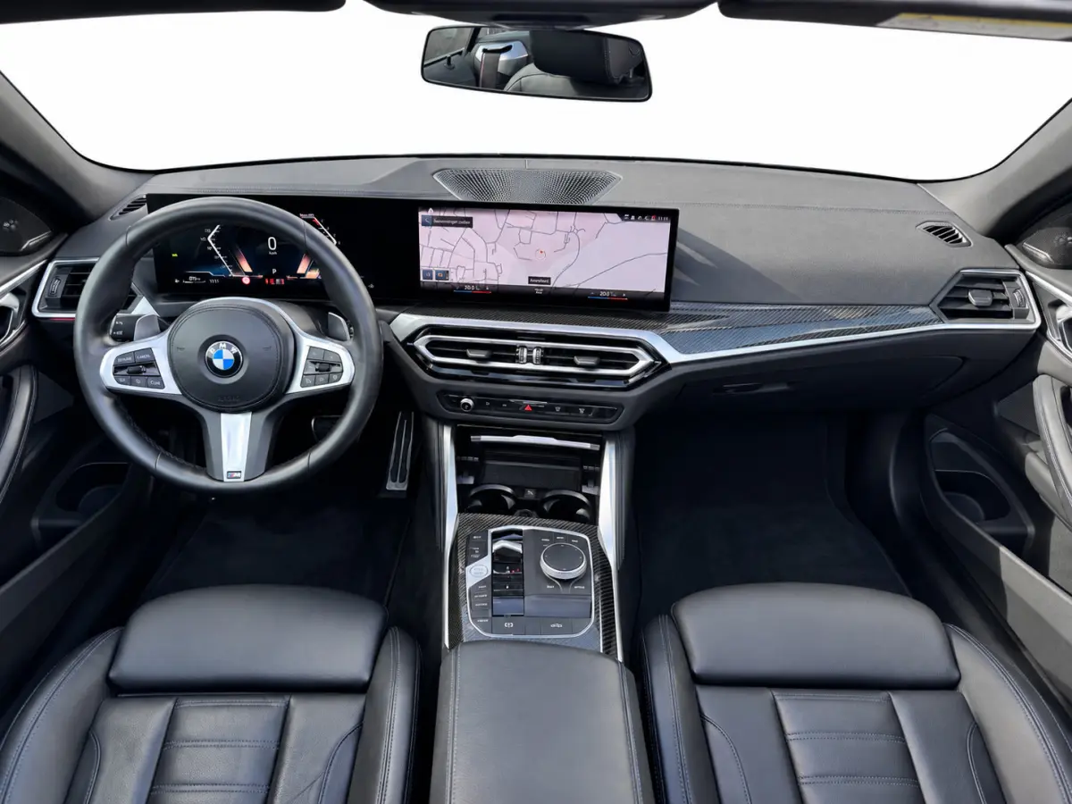 420i M-Sport | Brooklyn Grey | Harman Kardon | 19 inch | Facelift | Widescreen | Stoelverwarming | Carbon