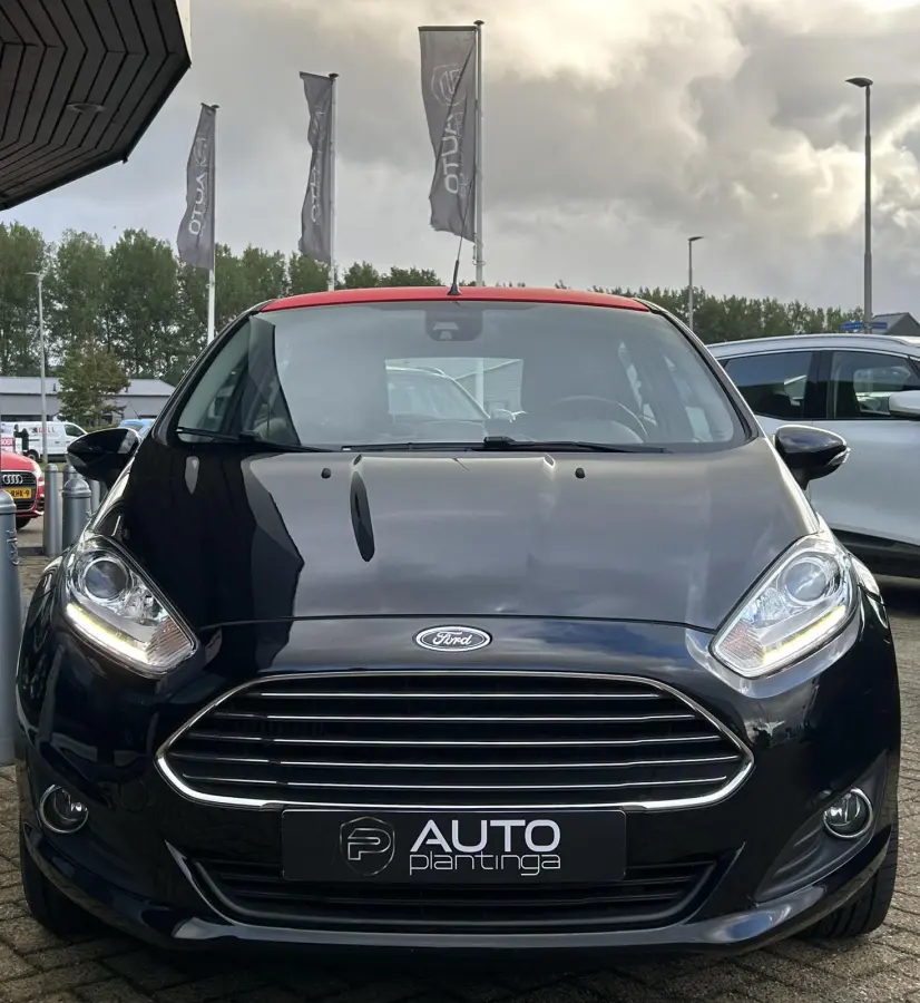 1.0 EcoBoost Titanium 101PK | AUTOMAAT | DEALERONDERHOUDEN | NL AUTO | NAP | Navigatie | Cruise Control | Climate Control | Parkeersensoren | Voorruitverwarming | Lichtmetalen Velgen | 2 Sle