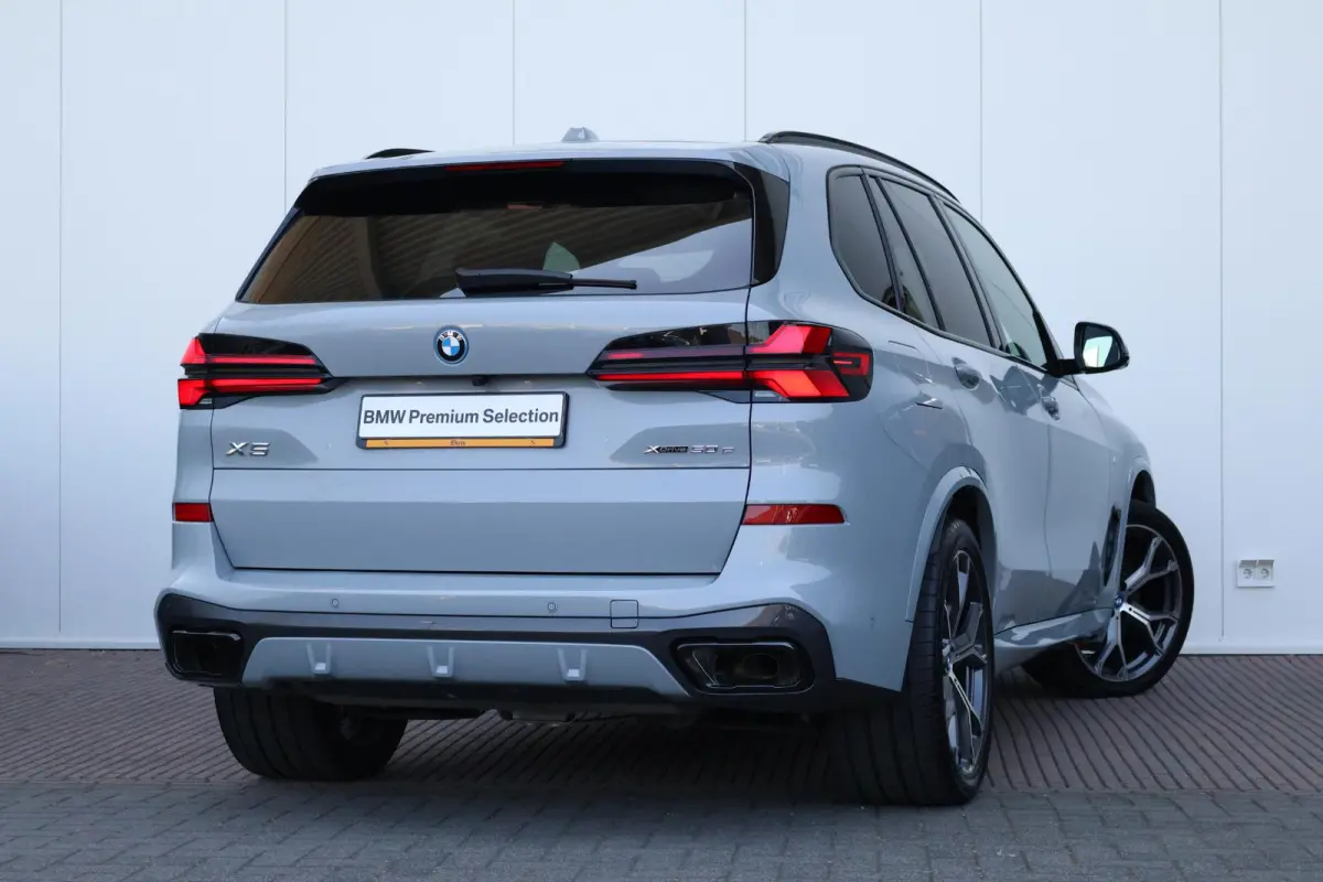xDrive50e | SoH 100% | Sportpakket Pro | Leder Invidual Merino Schwarz | Integral Active Steering | Driving Assistant Professional | Pano Dak | Harman Kardon |