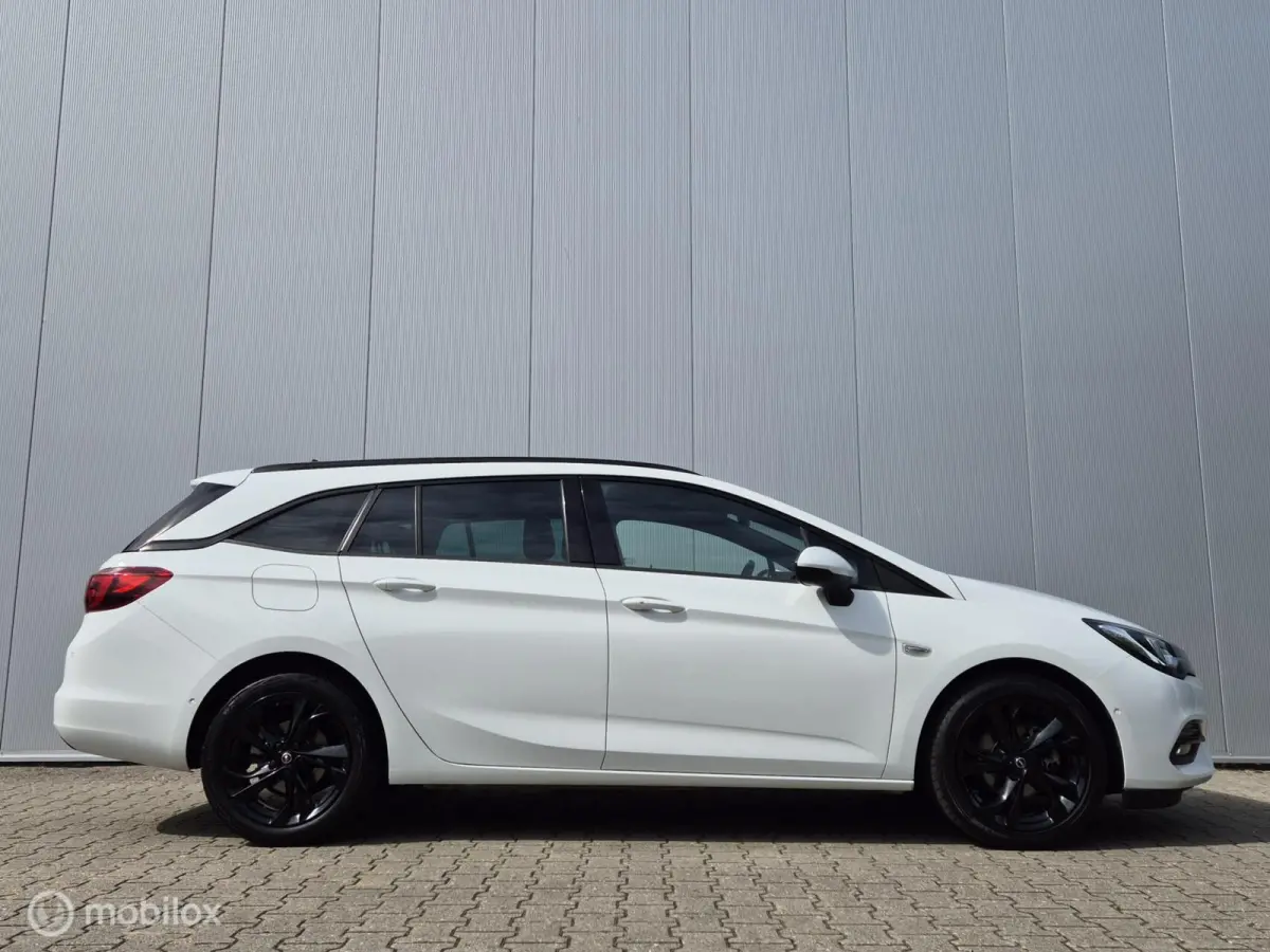 1.4 ULTIMATE AUTOMAAT/STOEL+BANKVERWARMING/KEYLESS/LED/PARK ASSIST/HALF LEDER/CAMERA