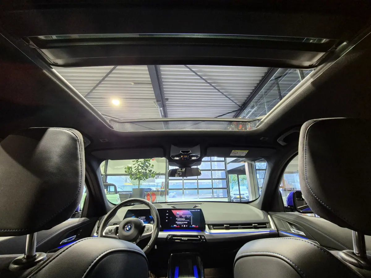 xDrive25e High Executive M-Sport | Panorama | HUD | 360 Camera | Stoelverwarming | Carplay/Android
