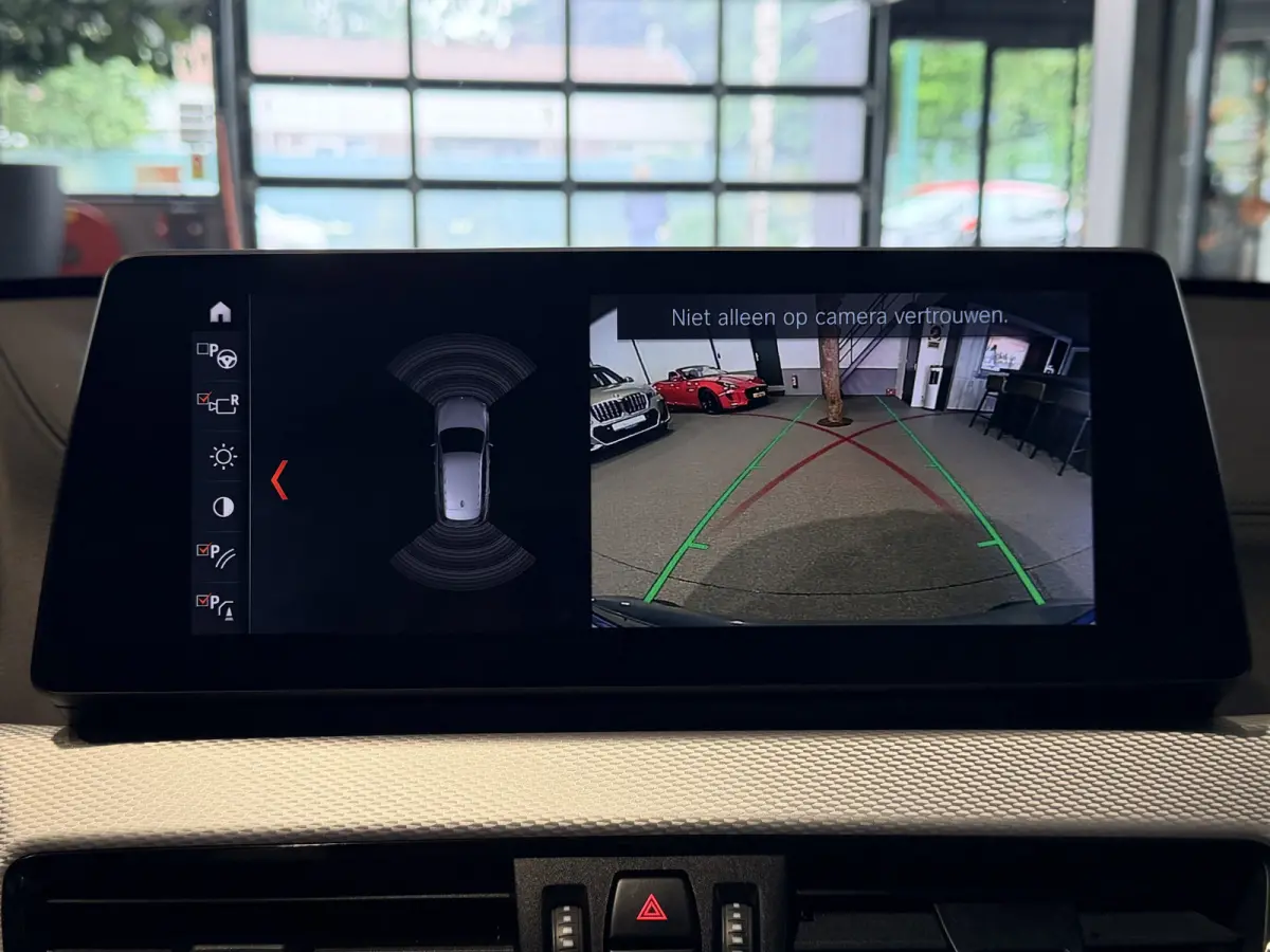 xDrive25e High Executive M-Sport | Panorama | Crème leder | Camera | Navigatie Plus
