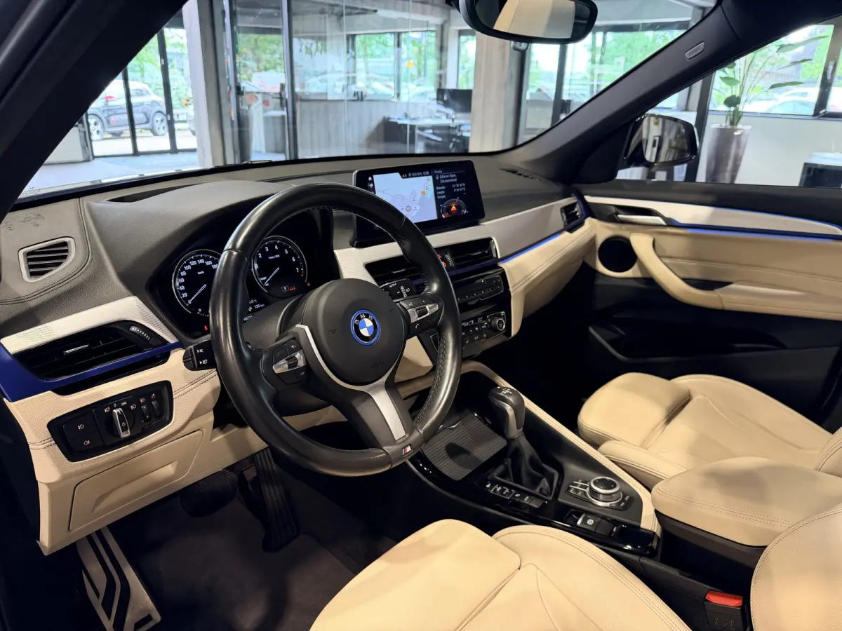 xDrive25e High Executive M-Sport | Panorama | Crème leder | Camera | Navigatie Plus