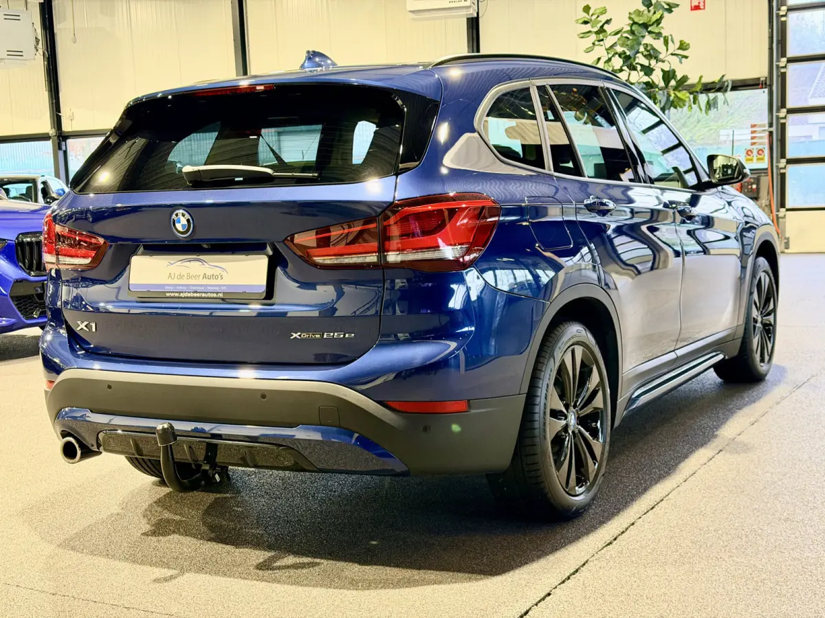 xDrive25e Executive Sportline | Camera | Trekhaak | Crème leder