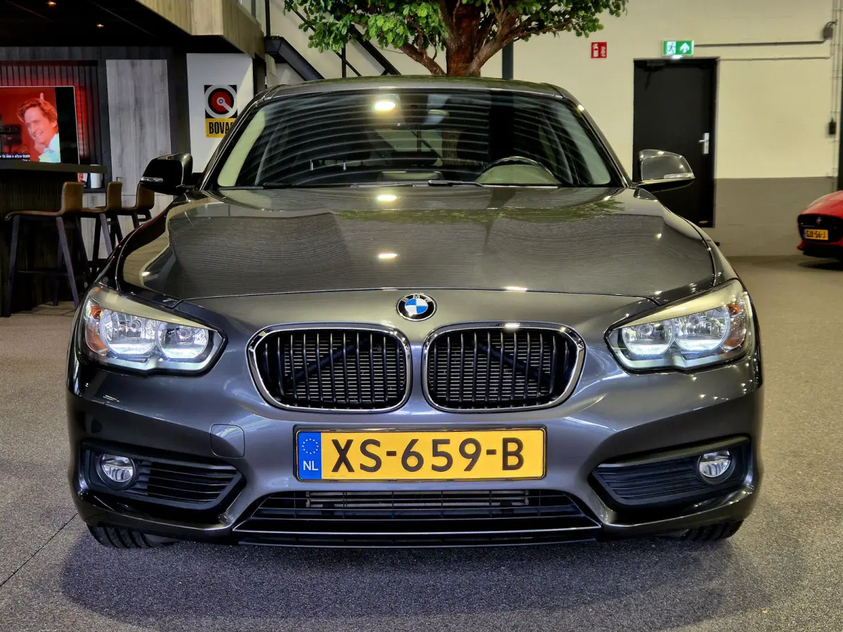 116i Executive Navigatie | Verw. stoelen| Sensoren | Trekhaak | Nette auto