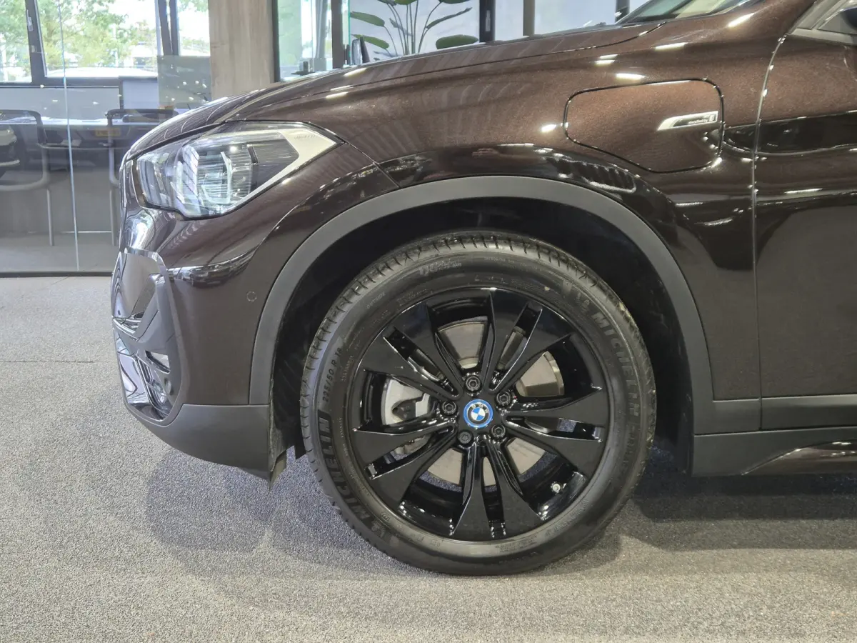 xDrive25e Executive Sportline | Sparkling Brown | Camera | HUD | Stoelverwarming