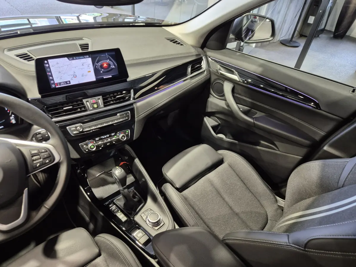 xDrive25e Executive Sportline | Sparkling Brown | Camera | HUD | Stoelverwarming