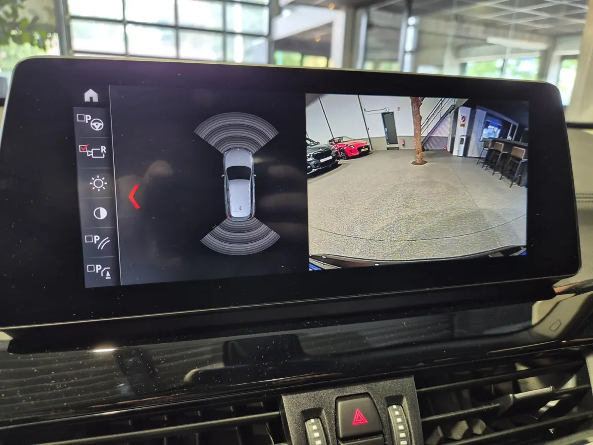 xDrive25e Executive Sportline | Sparkling Brown | Camera | HUD | Stoelverwarming