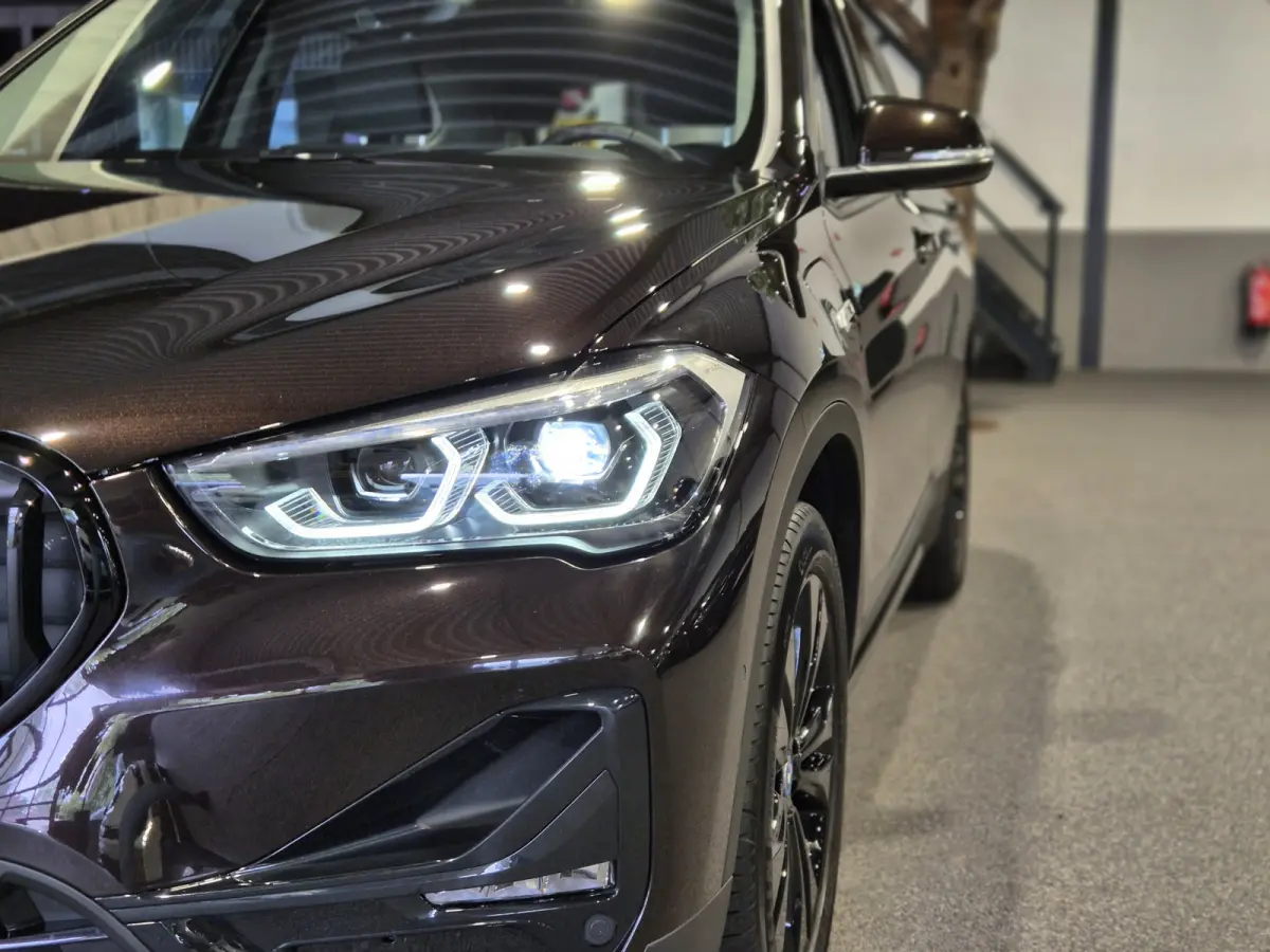 xDrive25e Executive Sportline | Sparkling Brown | Camera | HUD | Stoelverwarming