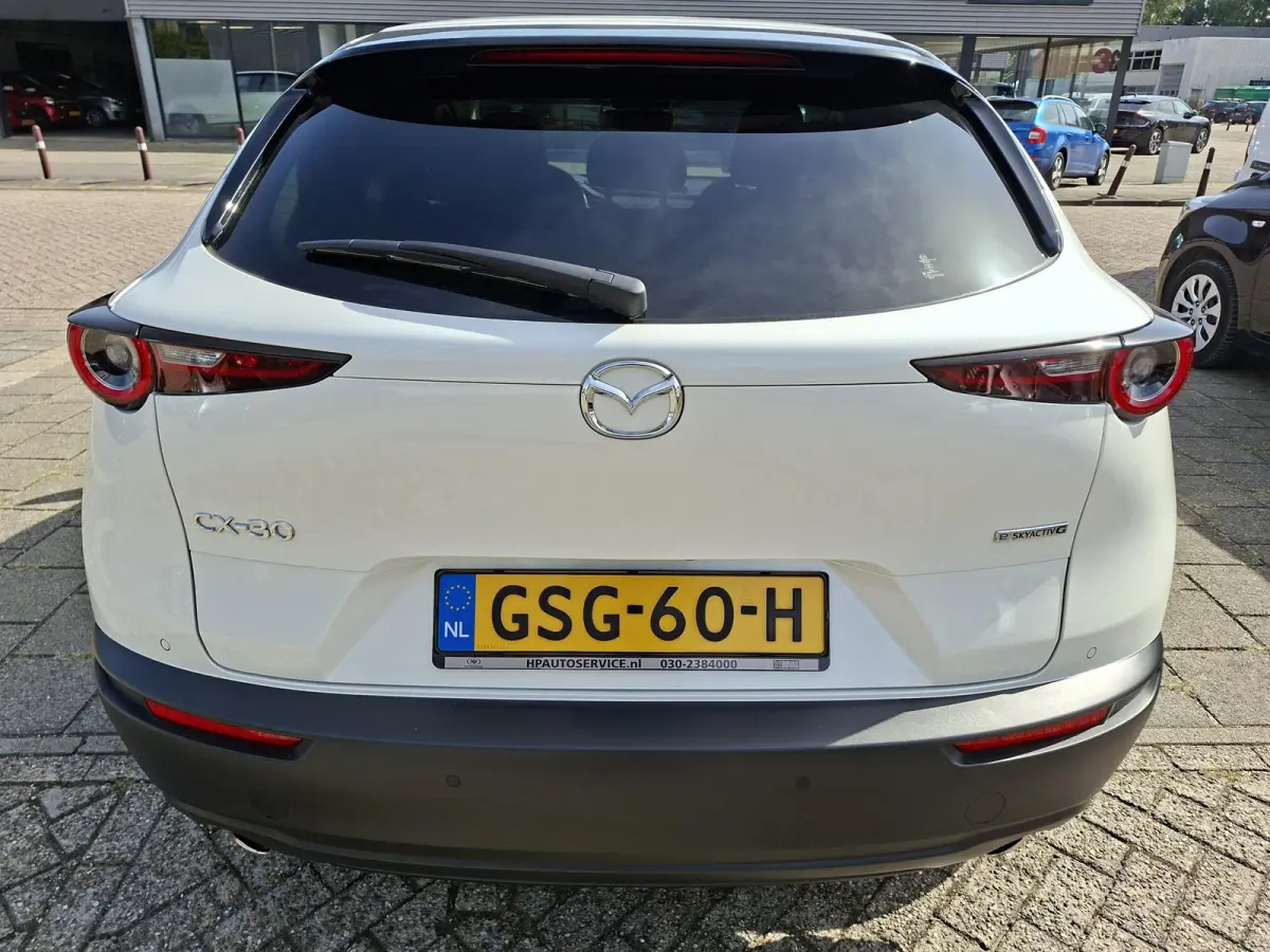 2.0 e-SkyActiv-G M Hybrid Homura PearlWhite Adaptive-Cruise Carplay Elek.Achterklep Achteruitrijcamera Head-Up NAP!