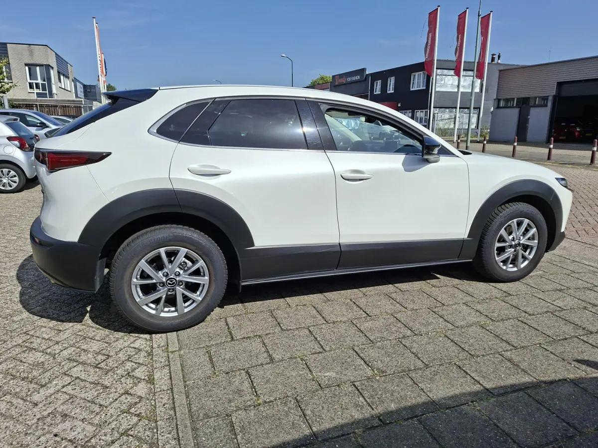 2.0 e-SkyActiv-G M Hybrid Homura PearlWhite Adaptieve-Cruise Carplay Elek.Achterklep Achteruitrijcamera Head-Up NAP!