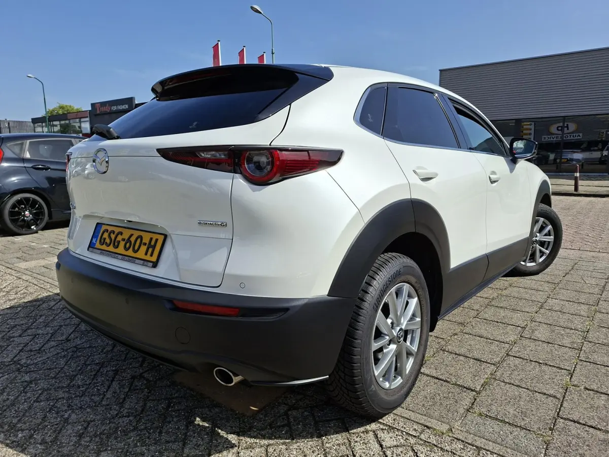 2.0 e-SkyActiv-G M Hybrid Homura PearlWhite Adaptieve-Cruise Carplay Elek.Achterklep Achteruitrijcamera Head-Up NAP!