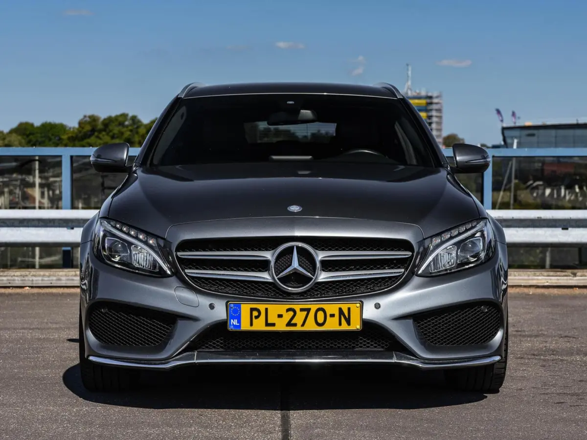 180 Business Solution AMG 156 PK Aut. | Leder | Navigatie | Camera | LED | Trekhaak | 18"