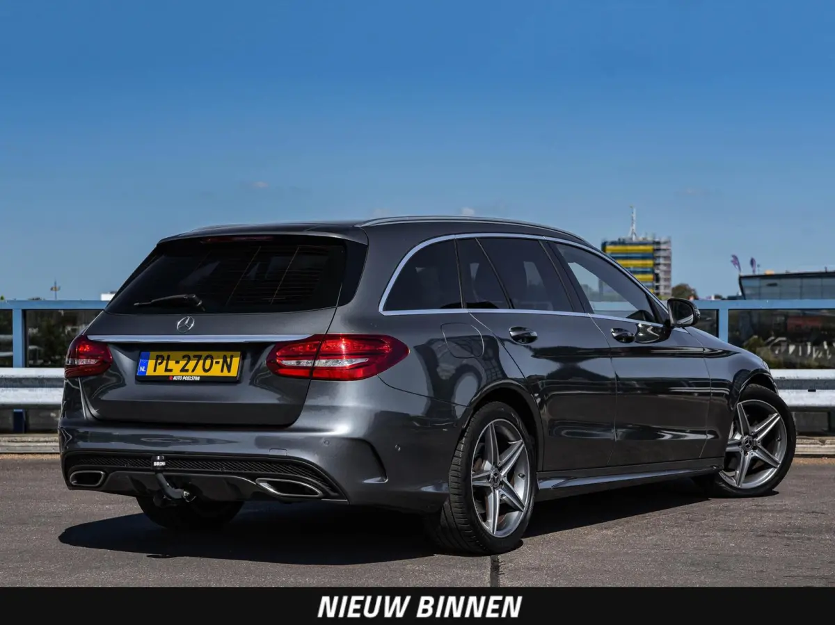 180 Business Solution AMG 156 PK Aut. | Leder | Navigatie | Camera | LED | Trekhaak | 18"