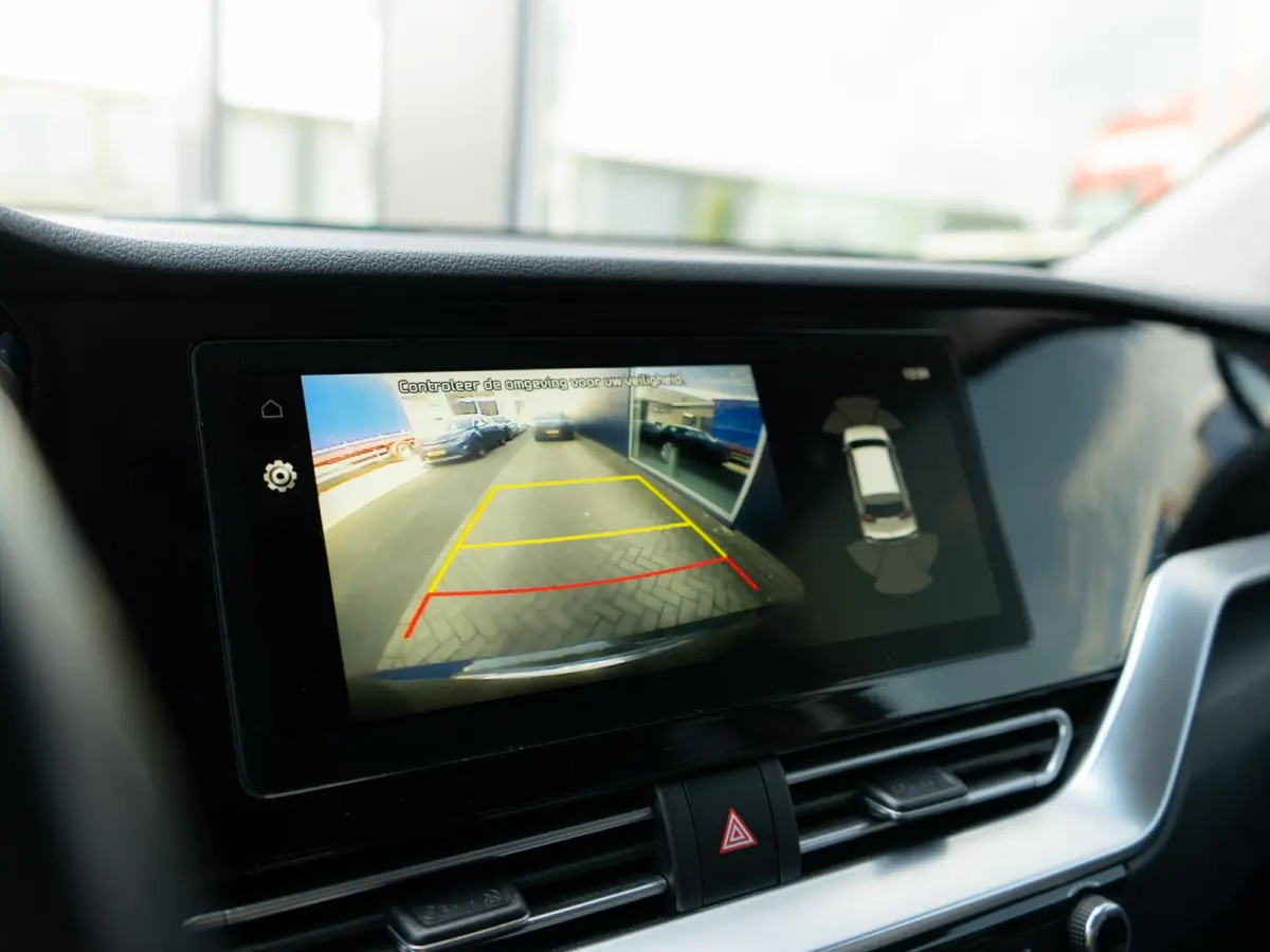 DynamicPlusLine 64 kWh SOH 99,7 % | Stoel en stuurverwarming | Schuif/-kanteldak | Achteruitrijcamera | Navigatie | Carplay | PDC voor & achter | Achteruitrijcamera