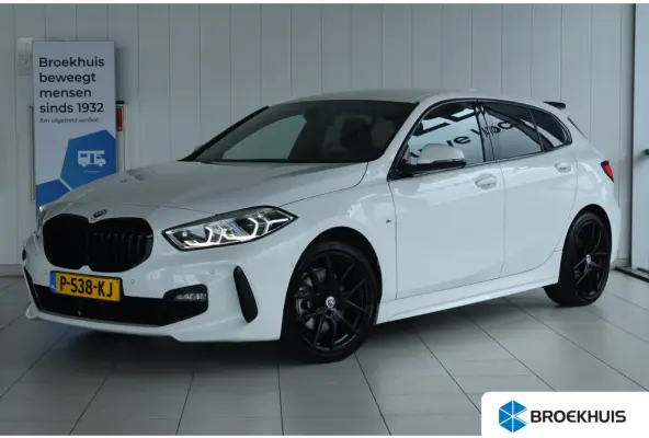 118i Business Edition M-Sport | Cruise Control | Stuurverwarming | Camera | Adaptief LED | Climate | Carplay | Navi |
