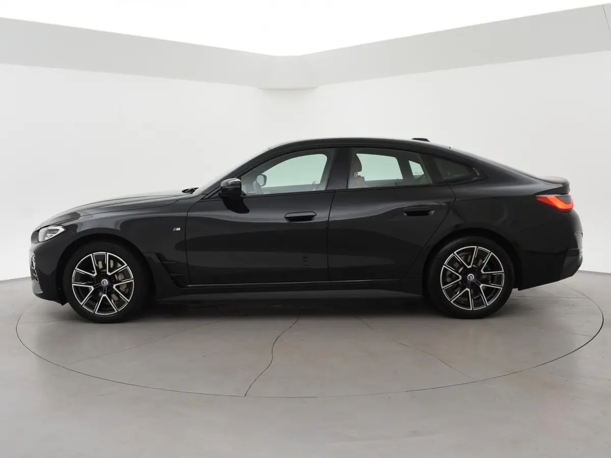 eDrive40 84 kWh M-SPORT + ADAPTIVE CRUISE | SFEERVERLICHTING | LEDER SPORTINTERIEUR