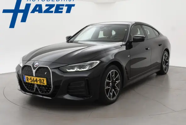 eDrive40 84 kWh M-SPORT + ADAPTIVE CRUISE | SFEERVERLICHTING | LEDER SPORTINTERIEUR