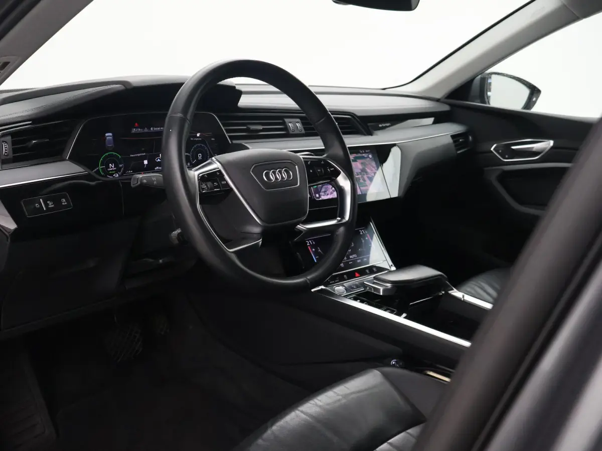 55 95 KWH 408 PK + 21 INCH | LEDER | ADAPTIVE CRUISE | LUCHTVERING | CARPLAY | CAMERA