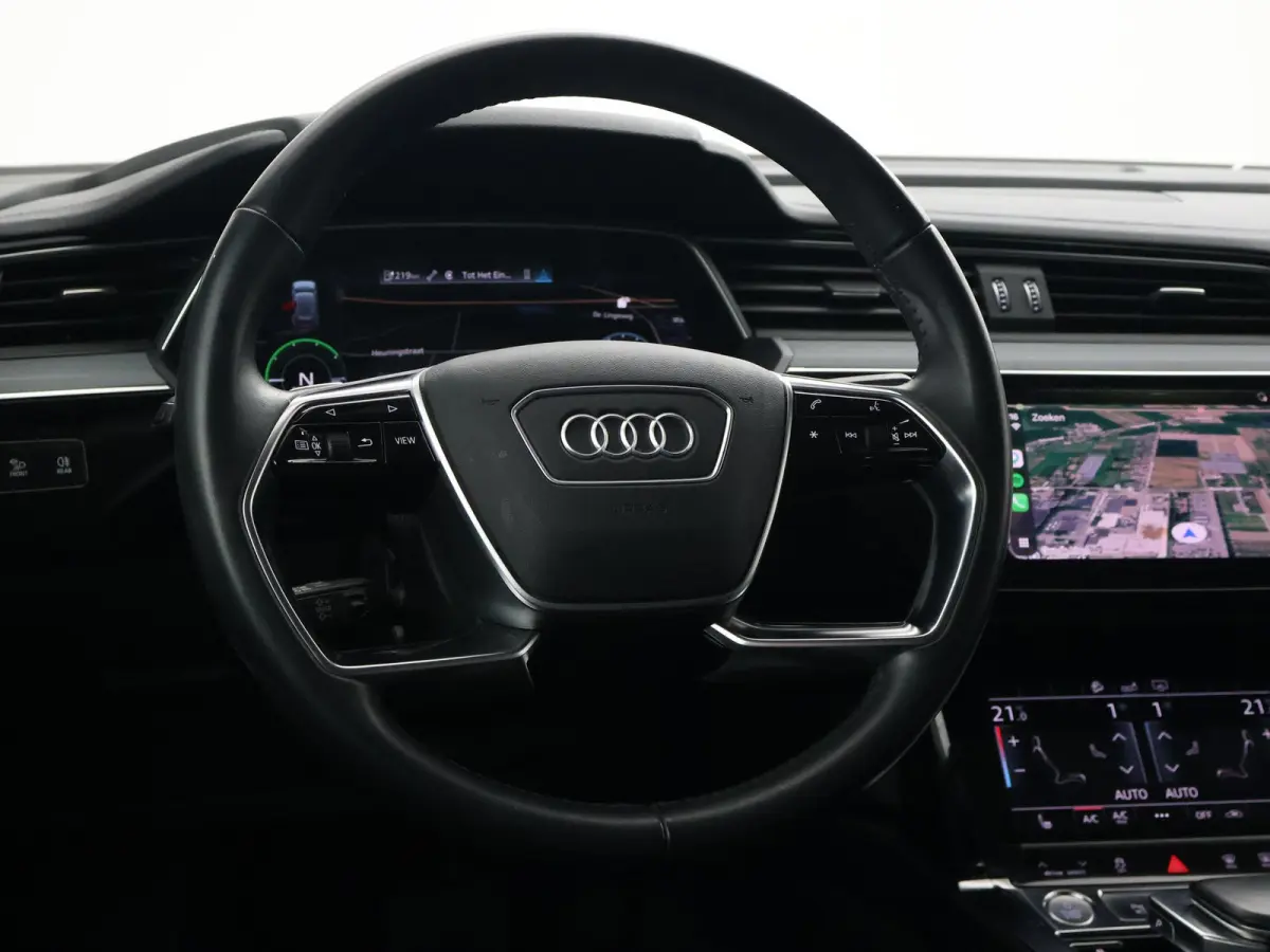 55 95 KWH 408 PK + 21 INCH | LEDER | ADAPTIVE CRUISE | LUCHTVERING | CARPLAY | CAMERA