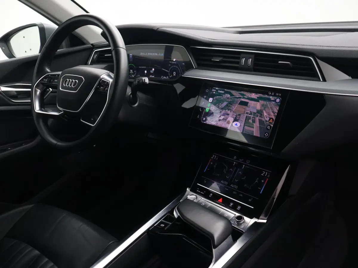 55 95 KWH 408 PK + 21 INCH | LEDER | ADAPTIVE CRUISE | LUCHTVERING | CARPLAY | CAMERA