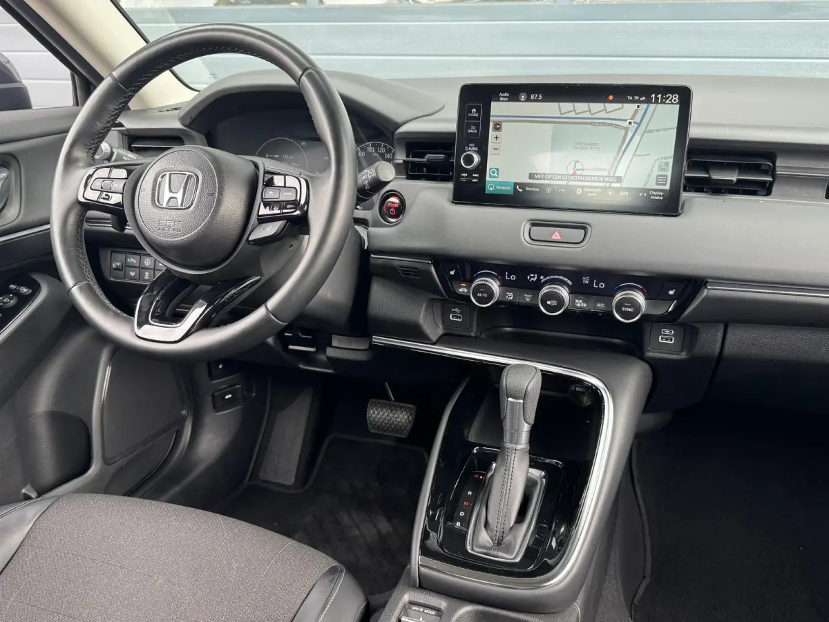 1.5 E:HEV ADVANCE I AUTOMAAT I P-CAMERA I STOELVERWARMING I APPLE CARPLAY I ANDROID AUTO