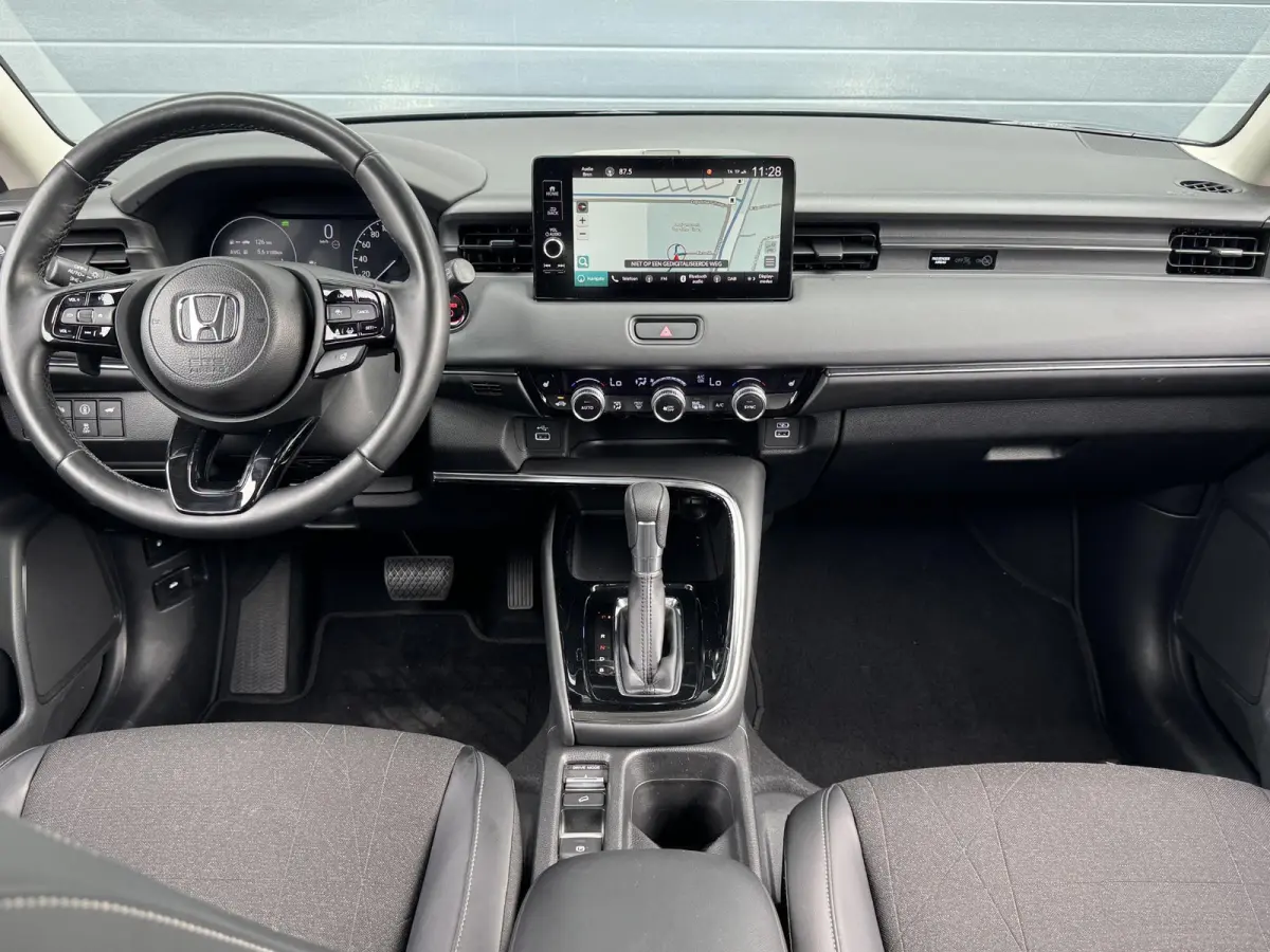 1.5 E:HEV ADVANCE I AUTOMAAT I P-CAMERA I STOELVERWARMING I APPLE CARPLAY I ANDROID AUTO