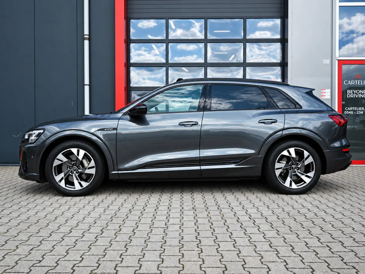 55 Quattro S-Line 95 kWh | Full Option | Origineel NL | Pano | Luchtvering | B&O | Memory | 360 | Adaptive | Carplay | Digital Dash | Alcantara | Matrix Led | Keyless | Ambient | F1 Flippers